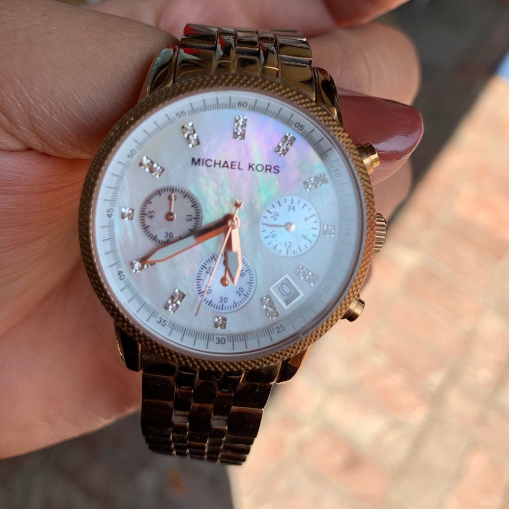 Michael Kors rose gold watch with mother of pearl